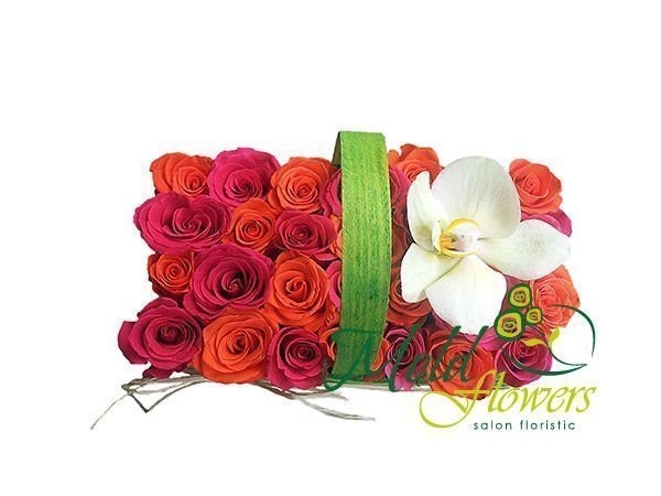 Green basket with pink and orange roses, white phalaenopsis orchid photo